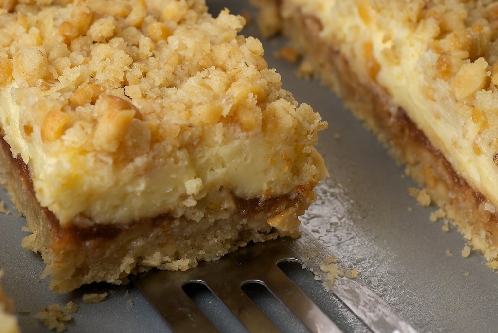 Cream Cheese and Oat Bars are all about the layers with an oat crust, apple butter, and sweet cream cheese.