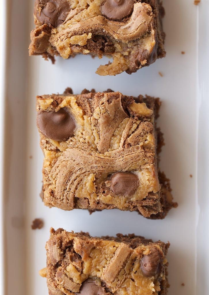 Peanut Butter Brownies are rich brownies swirled with peanut butter and dotted with mini peanut butter cups. Absolutely delicious! - Bake or Break