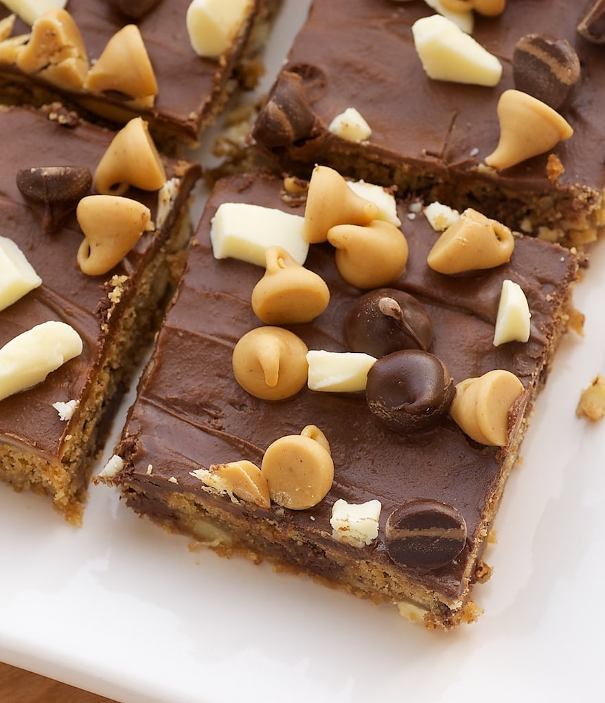 Peanut Butter Mud Bars are delicious bars packed with chocolate, peanut butter, white chocolate, and nuts. - Bake or Break