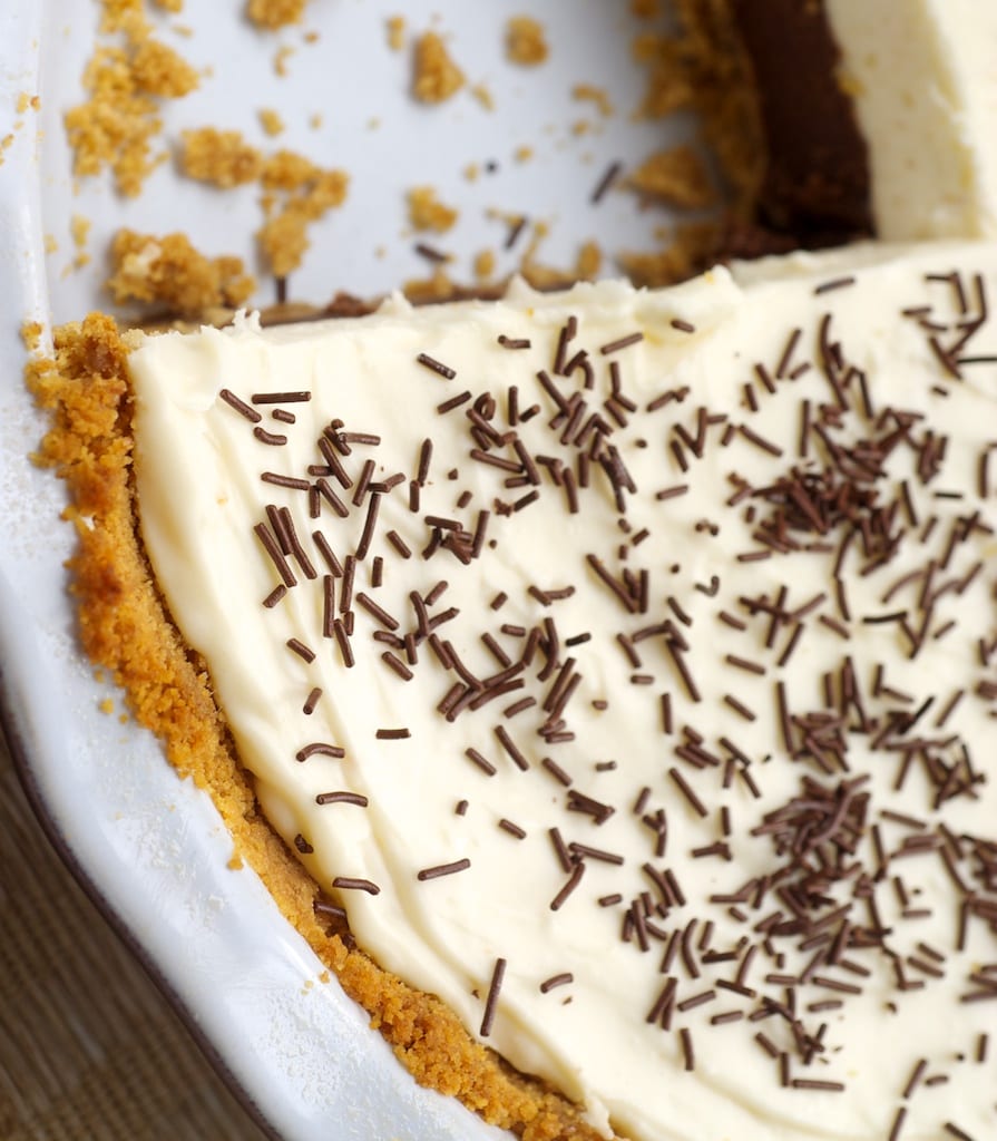 Chocolate Cookie Dough No-Bake Cheesecake combines rich chocolate cookie dough with a sweet no-bake cheesecake for an irresistible dessert! - Bake or Break