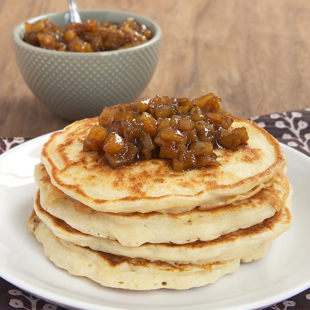 Light, moist, delicate, Ricotta Almond Pancakes are topped with a sweet, cinnamon-y pear topping for a delicious treat for breakfast, brunch, or even dinner!
