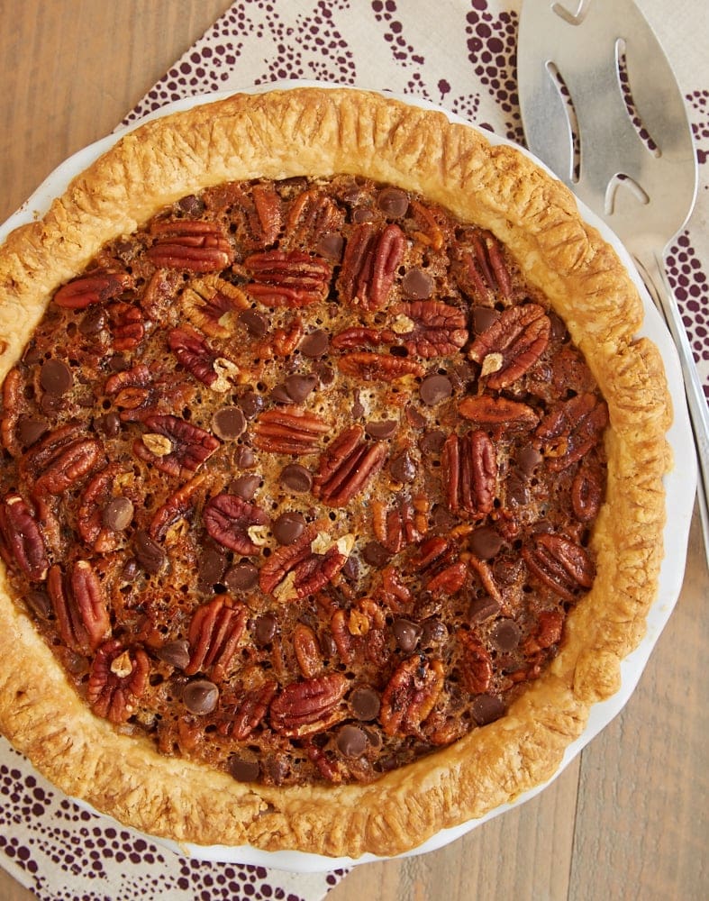 Classic pecan pie gets even better and more flavorful in this Chocolate Chip Coconut Pecan Pie! - Bake or Break